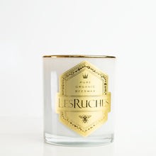 Load image into Gallery viewer, Les Ruches organic bees wax candles are crafted with pure organic beeswax from natural golden yellow honey (no bleach or colorants) &amp; lead-free cotton wicks.  Hand poured in Los Angeles and features hat box packaging.    Set includes 2.5oz candles in 9  luxurious scents ...  - Black Fig, Bambou, Bergamont, Bois de Santal, Cassis, Citronne, Le tabac,  Cassis (Black Currant) - Le Tebac (Maple Vanilla)
